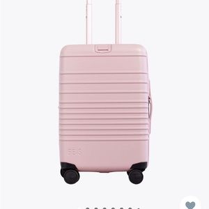 SOLD** Beis 21” carry on luggage. Price is firm, NOT TAKING OFFERS.